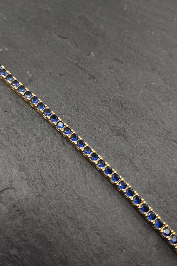 Pulsera dorada Cincuenta lapislázulis