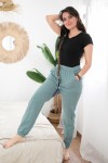 Pantalón largo unisex de tejido fino con cintura elástica y bolsillos laterales