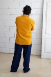 Pantalón largo unisex de tejido fino con cintura elástica y bolsillos laterales Pantalón largo unisex de tejido fino con cintura elástica y bolsillos laterales