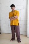 Pantalón largo unisex de tejido fino con cintura elástica y bolsillos laterales Pantalón largo unisex de tejido fino con cintura elástica y bolsillos laterales