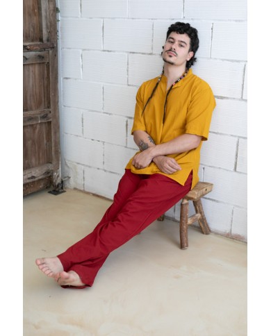 Pantalón largo unisex de tejido fino con cintura elástica y bolsillos laterales