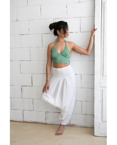 Pantalón sarouel de algodón con bolsillos laterales.