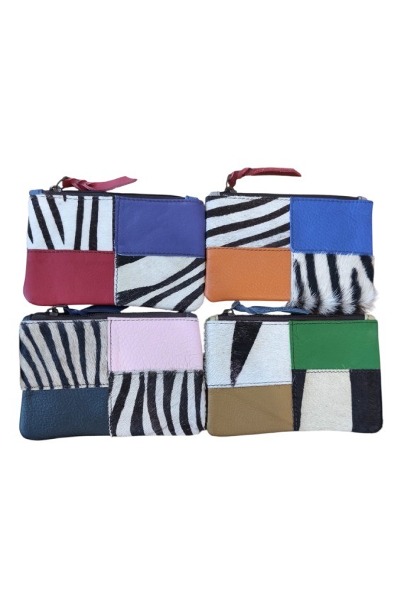 Monederos patchwork de piel reciclada con estampado animal print y colores vivos, diseño artesanal Samarkanda.