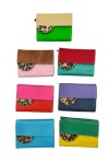Carteras multicolor de piel reciclada Soruka con solapa animal print, diseño artesanal sostenible Samarkanda. Carteras multicolor de piel reciclada Soruka con solapa animal print, diseño artesanal sostenible Samarkanda.