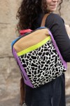 Bolso Mochila Vaca de piel sostenible y ecofriendly, diseño artesanal multicolor con print animal, hecho a mano
