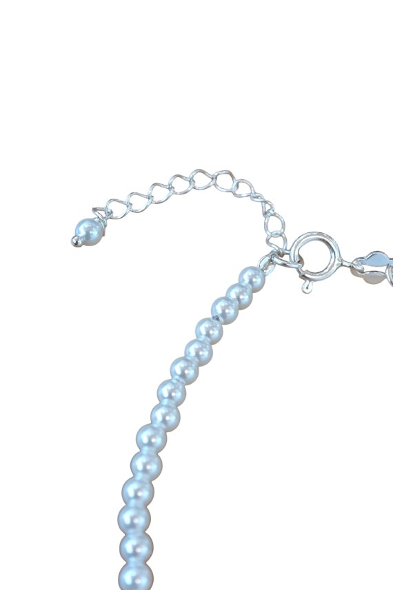 Pulsera en plata de ley con bolitas de perla y colgante Árbol de la Vida, símbolo de fuerza y crecimiento. Pulsera en plata de ley con bolitas de perla y colgante Árbol de la Vida, símbolo de fuerza y crecimiento.