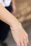 Pulsera en plata de ley con bolitas de perla y colgante Árbol de la Vida, símbolo de fuerza y crecimiento. Pulsera en plata de ley con bolitas de perla y colgante Árbol de la Vida, símbolo de fuerza y crecimiento.