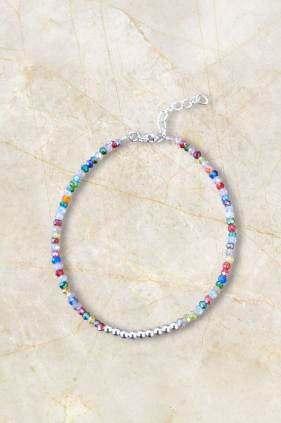 Pulsera en plata de ley con piedras semipreciosas cristalizadas multicolor y bolitas centrales en plata. Pulsera en plata de ley con piedras semipreciosas cristalizadas multicolor y bolitas centrales en plata.