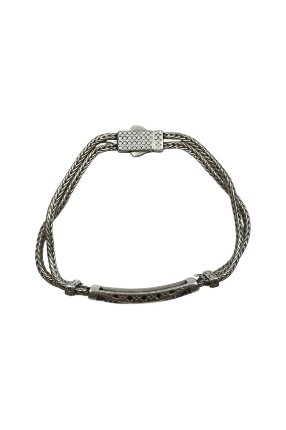 Pulsera de plata con doble cordón trenzado y barra labrada inspirada en Ashtamangala