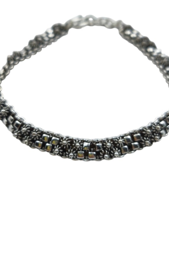 Pulsera de plata doble tejido con eslabones decorativos y cierre tipo gancho