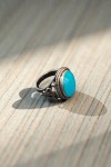 Anillo unisex de plata de ley 925 con piedra semipreciosa turquesa y diseño artesanal