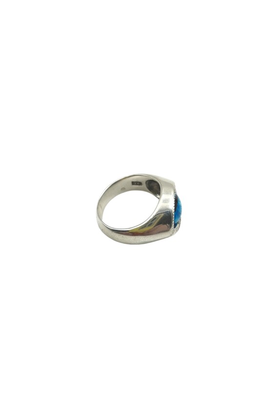 Anillo unisex de plata de ley con ojo decorativo central en color azul.