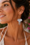 Pendientes de acero inoxidable con aro y colgante de elefante, diseño boho disponible en acabado dorado y plateado.