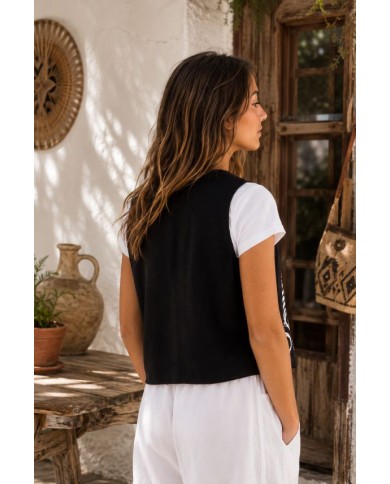 Chaleco floral negro de viscosa y lino con motivos blancos y forro de algodón Samarkanda