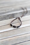 Pulsera Selva de Cuero Marrón Trenzado con Eslabón Metálico