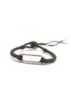 Pulsera Camino de cuero marrón trenzado con eslabón metálico alargado de acabado plateado.