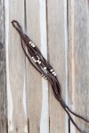 Pulsera boho Cascada de cuero marrón con abalorios plateados y diseño artesanal Samarkanda.