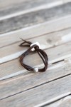 Pulsera Multitira Cuero con Bola de Zamak