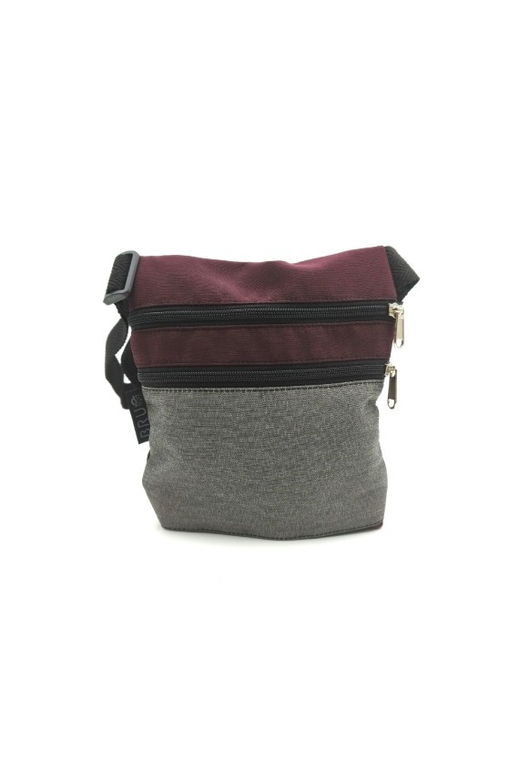 Riñonera de algodón con doble bolsillo frontal, cremalleras y correa ajustable.