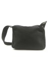 Bolso bandolera de algodón con bolsillo frontal de cremallera.